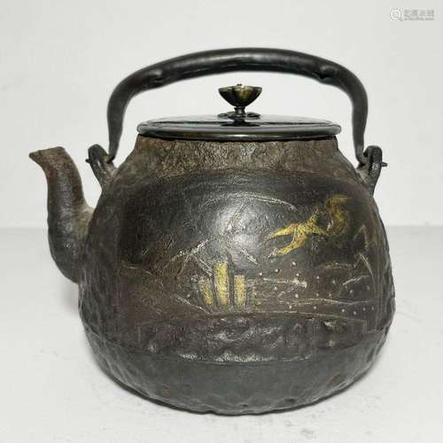 A CHINESE BRONZE TEAPOT