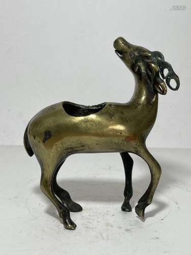 A CHINESE GILT BRONZE FIGURE OF A DEER, QING DYNASTY (1644-1...