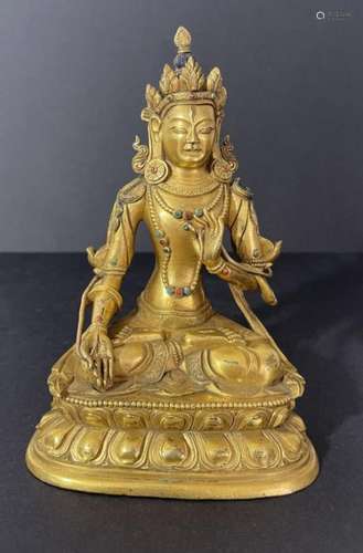 A VERY RARE AND IMPORTANT CHINESE TIBETAN GILT BUDDHA FIGURE...