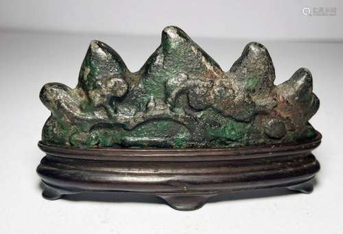 A CHINESE BRONZE BRUSH REST IN THE SHAPE OF A MOUNTAIN, QING...