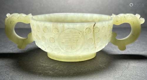 A RARE CHINESE JADE DOUBLE HANDLE CUP, QING DYNASTY (1644-19...