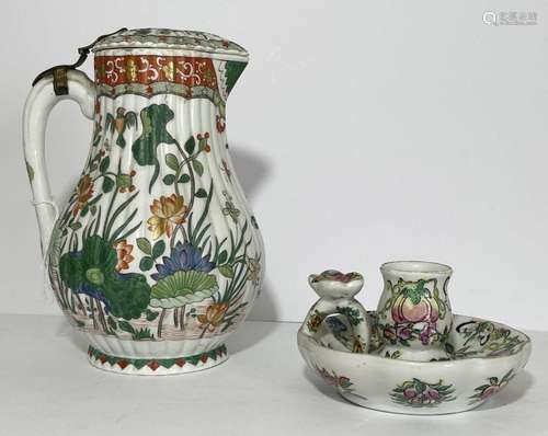 A FAMILLE VERTE LIDDED EWER AND A FAMILLE ROSE CANDLESTICK H...