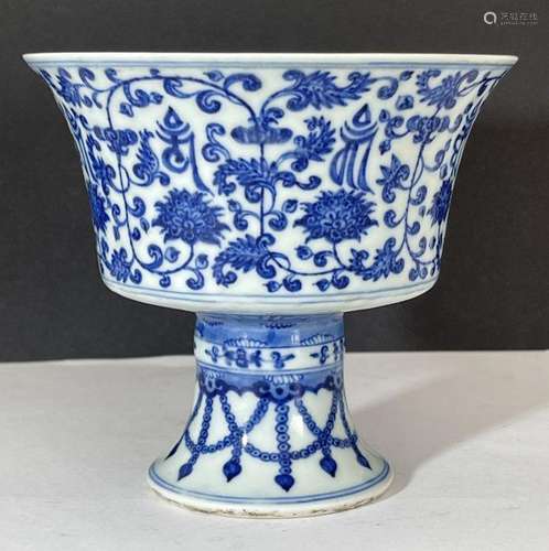 A CHINESE BLUE & WHITE FOOTED CEREMONIAL CUP, QING DYNAS...