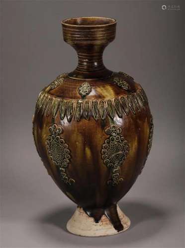 Tang Dynasty tri-color paste plate mouth bottle