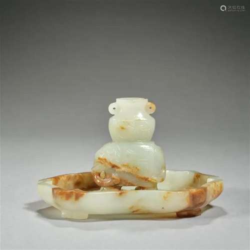 A separated jade carving 'elephant carring vase on a pla...