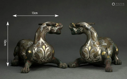 Pair of Gold and Silver Inlaid Bronze Beasts