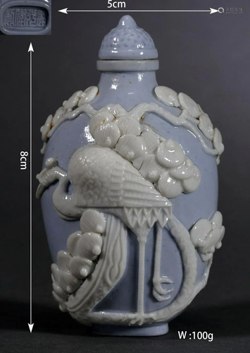 Carved Porcelain Snuff Bottle