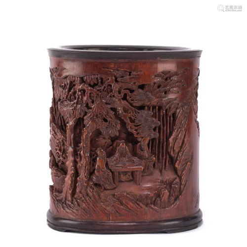 A CARVED WOODEN BRUSHPOT