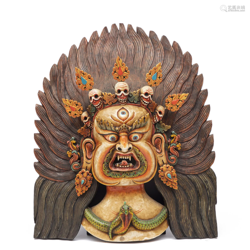 A VERY RARE TIBETAN WOODEN MASK OF MAHAKALA