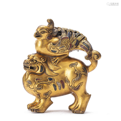 A CHINESE BRONZE-GILT MYTHICAL BEAST