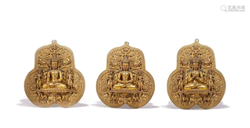 A SET OF TIBETAN BRONZE-GILT TRINITY BUDDHAS