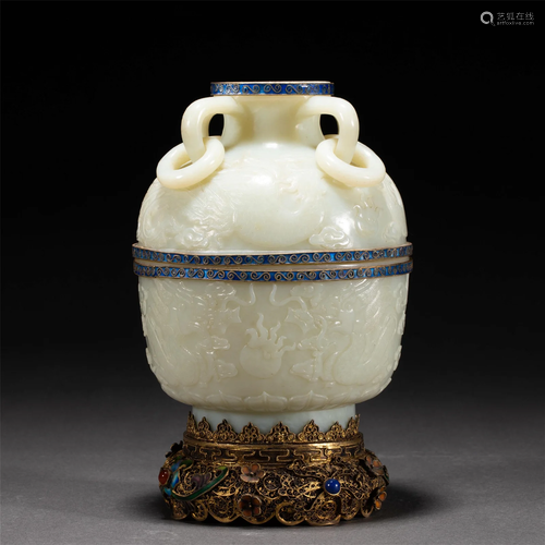 A CHINESE CARVED JADE DRAGONS VASE