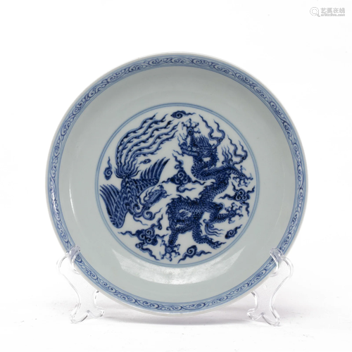 A CHINESE BLUE AND WHITE DRAGON AND PHOENIX SAUCER