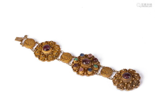 A HARD-STONES INLAID SILVER-GILT BRACELET