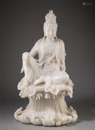 A CHINESE CARVED MARBLE FIGURE OF GUANYIN