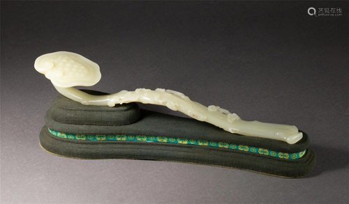 A CARVED WHITE JADE RUYI SCEPTER