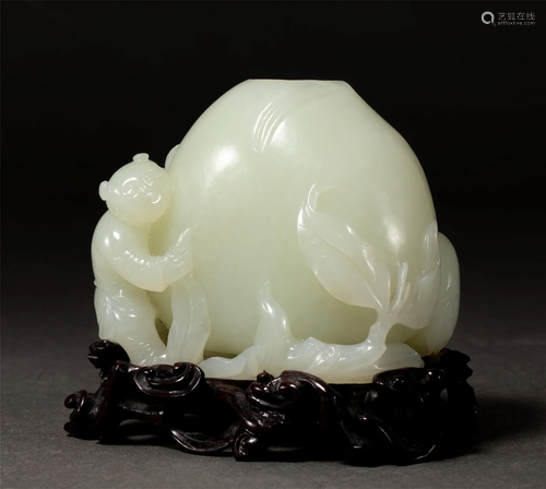 A CHINESE CARVED JADE PEACH FORM WATER DROPPER