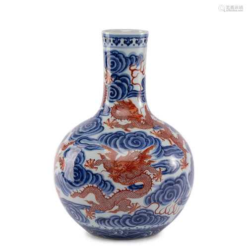 A CHINESE UNDERGLAZE BLUE AND IRON RED GLOBULAR VASE