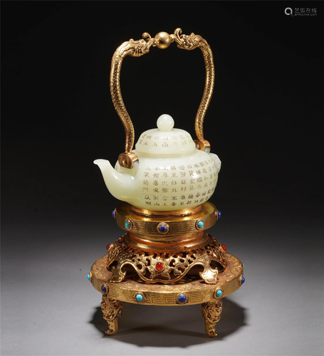 A CHINESE INSCRIBED JADE TEAPOT