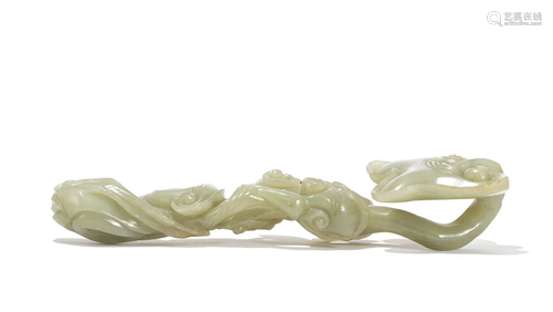 A CHINESE CARVED PALE CELADON JADE RUYI SCEPTRE