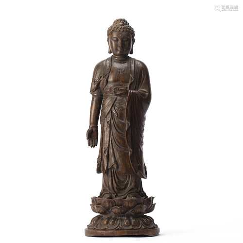 A CARVED ALOESWOOD BODHISATTVA