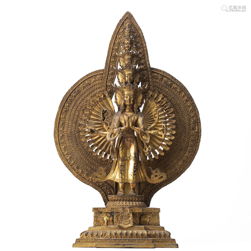 AN UNUSUAL TIBETAN BRONZE-GILT MULTI-HANDS AVALOKITESVARA