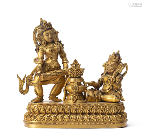 A TIBETAN BRONZE-GILT DEITIES GROUP