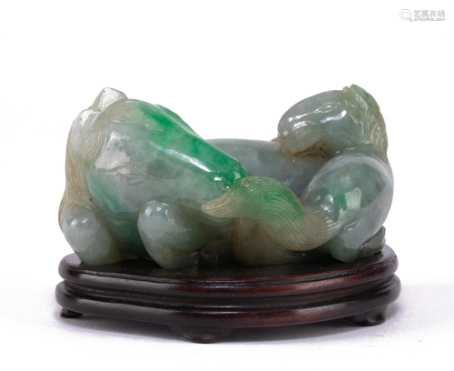 A CHINESE CARVED JADEITE DOUBLE HORSES