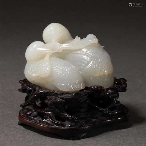 A CHINESE CARVED JADE LOVE BIRDS