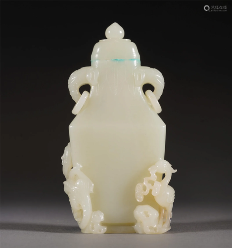 A CHINESE CARVED WHITE JADE VASE