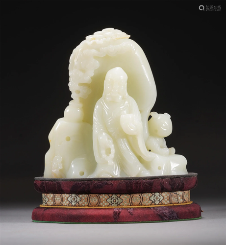 A CHINESE CARVED WHITE JADE ARHAT DECORATION