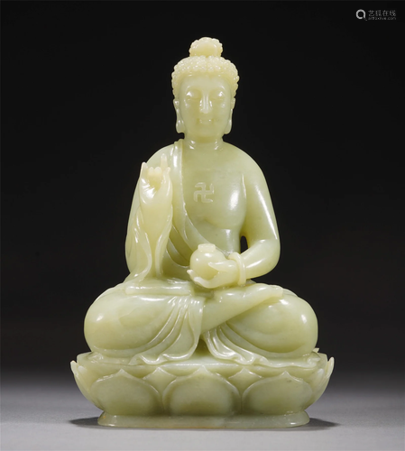 A CHINESE CARVED JADE FIGURE OF SHAKYAMUNI