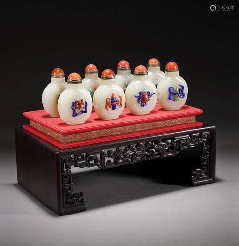 A SET OF EIGHT JADE SNUFF BOTTLES