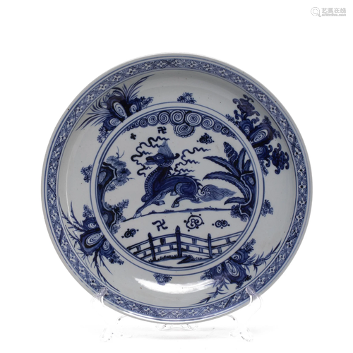 A CHINESE BLUE AND WHITE SAUCER