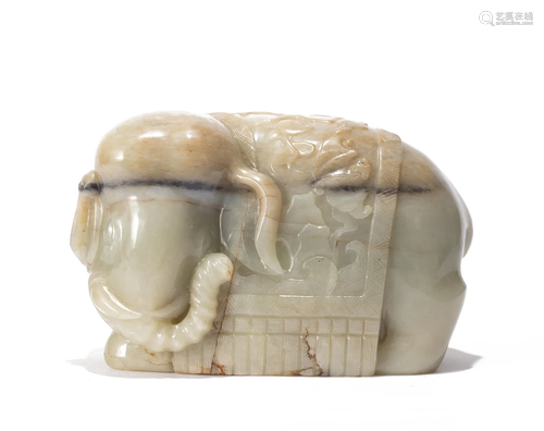 A CHINESE CARVED JADE ELEPHANT