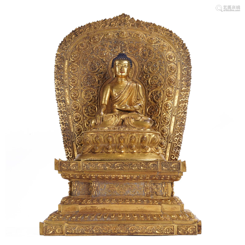 A TIBETAN BRONZE-GILT FIGURE OF SHAKYAMUNI