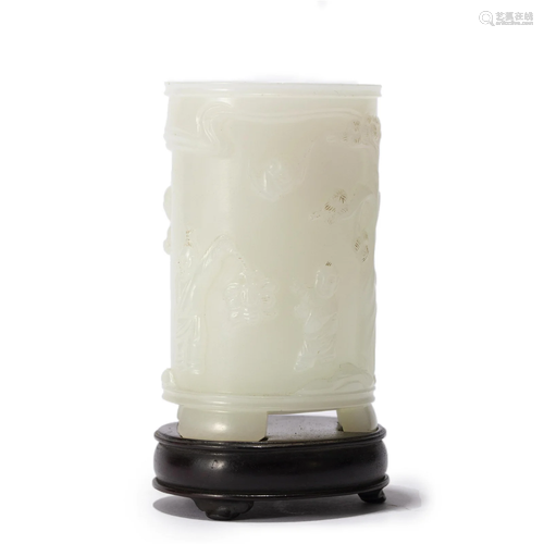 A CHINESE CARVED WHITE JADE BRUSHPOT