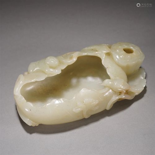 A CHINESE CARVED JADE WASHER