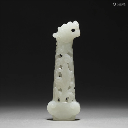 A CARVED WHITE JADE DAGGER HANDLE