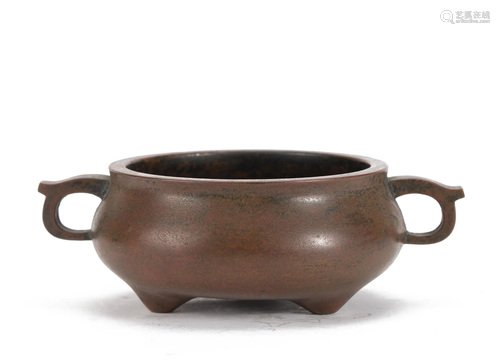 A CHINESE BRONZE TRIPOD CENSER