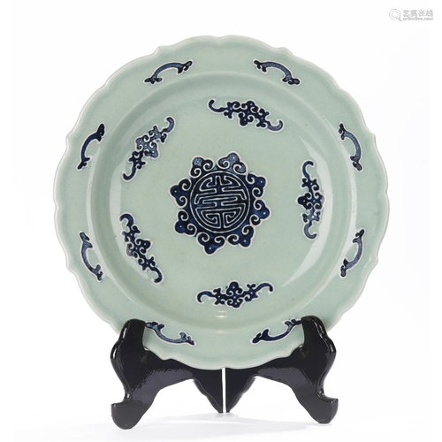 A CHINESE CELADON GROUND AND UNDERGLAZE BLUE DISH