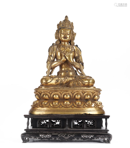 A TIBETAN BRONZE-GILT MAITREYA