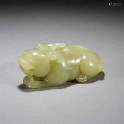 A CHINESE CARVED YELLOW JADE BEAST