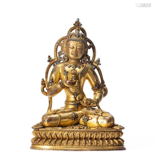 A TIBETAN BRONZE-GILT VAJRASATTVA