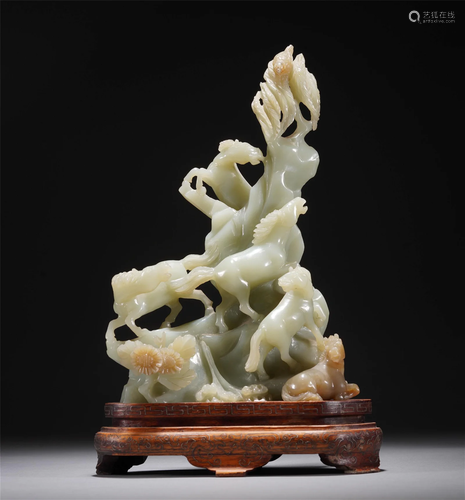 A CHINESE CARVED JADE DECORATION