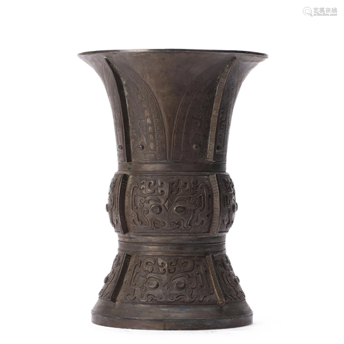 A CHINESE ARCHAIC SILVER BEAKER VASE GU