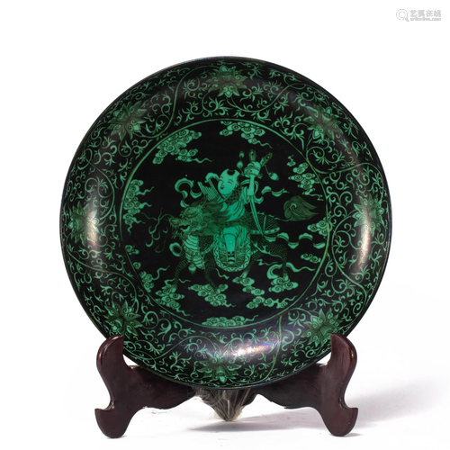 A CHINESE AUBERGINE GLAZE AND GREEN ENAMEL SAUCER