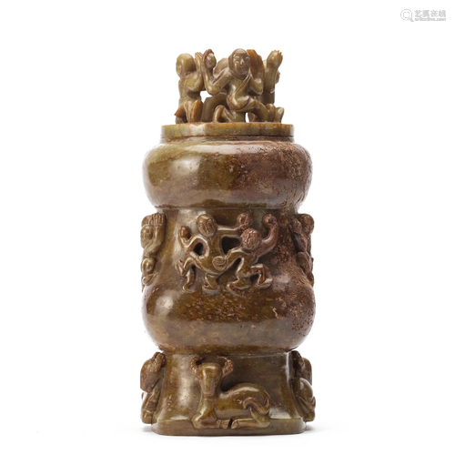 A CARVED JADE CONTAINER