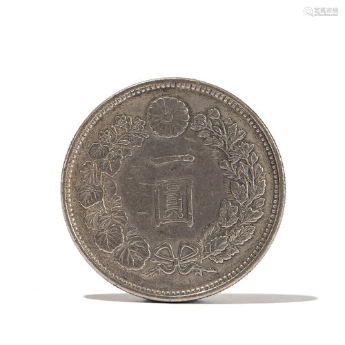 A CHINESE SILVER COIN