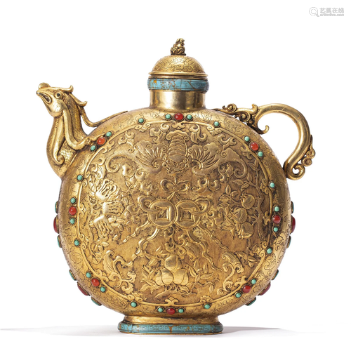 A TIBETAN BRONZE-GILT EWER